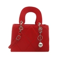 Glossy red quilted crossbody bag with silver ball charm and adjustable shoulder strap - Red