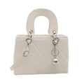 Elegant white quilted crossbody bag with diamond stitching and round metal charm - White