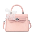 Chic light pink Kelly style handbag with snakeskin texture and a white lace bow detail - Pink