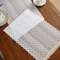White geometric lace table runner with fringe tassels on a dark wood surface - Triangle Stripes 10 / 35*91