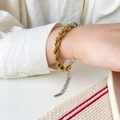 Detail of two-tone gold and silver rope chain bracelet with lobster clasp and extender - Two-Tone Rope Chain Bracelet
