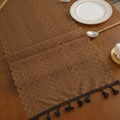 Crochet hollow table runner in coffee brown with dark grey tassels on wood table - Triangle Stripes 15 / 35*91