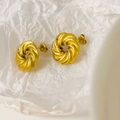 Detailed macro view of 18K gold plated chunky twisted spiral stud earrings with wave edges - Twist Texture