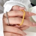 Polished gold and silver dual-finger rings shown on hand for a minimalist aesthetic - US 6 / Gold Two-finger Ring