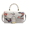 White crossbody bag with butterfly floral print and woven handle with gold buckles - White