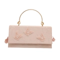 Pink lace handbag with butterfly embroidery and golden circular handle, 45-degree angle - Pink