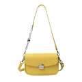 Chic yellow saddle bag in pebbled leather with silver chain strap and metal buckle - Yellow