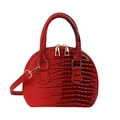Elegant red shell handbag with crocodile texture and golden hardware accents - Red