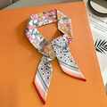 Detailed close-up of floral twilly silk scarf featuring pastel rainbow stripe patterns - Rice Pink