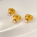 Three-piece set of gold double-layer hollow rings with clear zircon on water ripple background - US 6 / Double Layer Teardrop