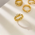 Detailed shot of double-layered 18K gold plated ring with square zircon in soft sunlight - Small / Geometric Combination Zirconia
