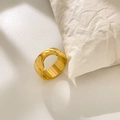 Detail of 18K gold plated titanium ring with diagonal grooves and polished hollow design - Hammered Wide Ring