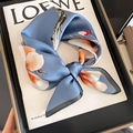 Elegant blue silk square scarf with white floral print tied in a delicate bow style - Square Scarf (ZS-319-Blue) / Blue