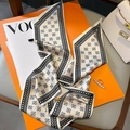 Detail of silk skinny scarf with geometric pattern and pearl ring on a fashion magazine - Beige White Border