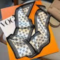 Detail of silk narrow scarf with paisley print on luxury box and leather bag - Beige Black Trim