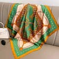Baroque style silk scarf with gold chain and key patterns draped on a beige sofa - 70x70cm / Green