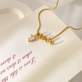 Detail of 18K gold-plated necklace featuring spiral pendant with teardrop zircon stone - Snake Shape Zirconia