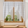 Elegant white lace door curtain with floral patterns and tassels in a warm home setting - 100*150cm / White