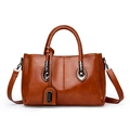 Caramelbraune Shopper Tasche aus Öl-Wachs-Leder mit geflochtenen Griffen und Silber-Hardware - Braun