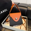 Sac à main boîte tendance bicolore orange et noir avec une texture plissée - Noir