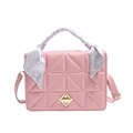 Pink quilted shoulder bag with gold twist lock and scarf-wrapped top handle - Pink