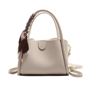Beige lychee pattern bucket bag with decorative silk scarf and adjustable strap - White