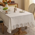 Retro Nordic lace tablecloth with white floral embroidery and ruffled edges on a wooden table - 140*220cm / Small Plum Blossom / White