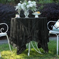 Elegant black floral lace tablecloth with ruffled edges on white outdoor table - Black Flower Mirror