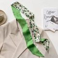 Detail of green floral twilly silk scarf tied on a beige blazer for a chic French style - Beige Green Floral (CT-398)