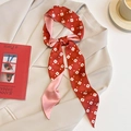 Floral red and pink twilly silk scarf tied in a bow on a beige blazer with a book - CT-408 / Red