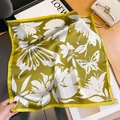 Detailed macro of silk square scarf featuring olive green floral patterns and branding - 53*53cm / Army Green