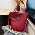 Wine red skull embossed tote bag in lychee texture leather with metal skull emblem - Red