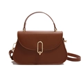 Minimalist dark brown crossbody bag with gold U-shaped buckle and smooth leather finish - Brown