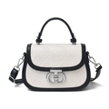 Beige embossed saddle bag with black trim and panda motif crossbody strap - Beige and Black