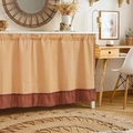 Yellow and white checkered cabinet curtain with rust red ruffle trim for dust protection - Orange Grid
