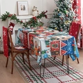 Detail of Christmas tablecloth featuring festive cartoon illustrations and warm holiday decor - Christmas Snow Scene