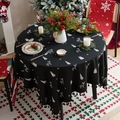 Nappe de Noël ronde noire avec motifs de rennes blancs, flocons et bordure à franges - 150x100cm / Renne de Noël Noir