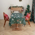 Nappe de Noël vert foncé avec motifs de rennes et flocons dans une ambiance chaleureuse - 140*100 / Élan Vert
