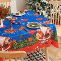 Royal blue Christmas tablecloth with Santa Claus print and red scalloped edges - Blue Christmas