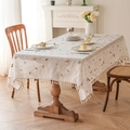 Rectangular cream linen tablecloth with orange floral embroidery and tassel fringe - Fan Flower