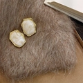 Irregular geometric resin stud earrings with gold metal frame on warm plush fabric - Off-white Polygon (E0287)