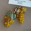 Orecchini a grappolo d'uva vintage con strass blu e perle di cristallo gialle - Orecchini / Giallo