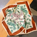 Elegant beige silk square scarf featuring green leaves and orange leopard print accents - 70x70cm / Beige Orange