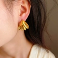 Elegant 18K gold plated banana leaf statement earrings featuring intricate radial textures - Gold (Banana Leaf)