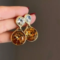 Orecchini in argento 925 con cristalli ambra e trasparenti in montatura dorata - Cristallo Champagne Sfaccettato (E1010)