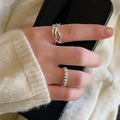 Unique twisted knot ring and beaded silver band set worn in a cozy winter lifestyle setting - Bamboo Joint Style (K110)