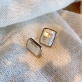 Macro shot of silver frame earrings with mosaic mother-of-pearl inlay on soft fabric - Rounded Rectangle 2*1.5cm / Silver
