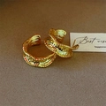 Detail of gold C-shape hoop earrings with hammered texture and vintage metallic finish - Wave Edge C-Shape / Gold (E2749)