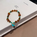 Bohemian tiger eye beaded bracelet with turquoise floral charm in gold finish - Tiger Eye Contrast Color Peace Buckle Style