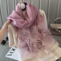 Detail of silk scarf with floral embroidery, shiny lurex trim and camellia brooch - Taro Purple / 70*180cm